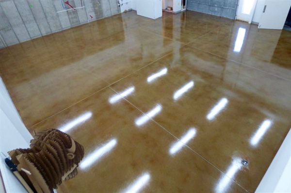 Why Epoxy Coatings Are the Perfect Complement to Concrete Staining